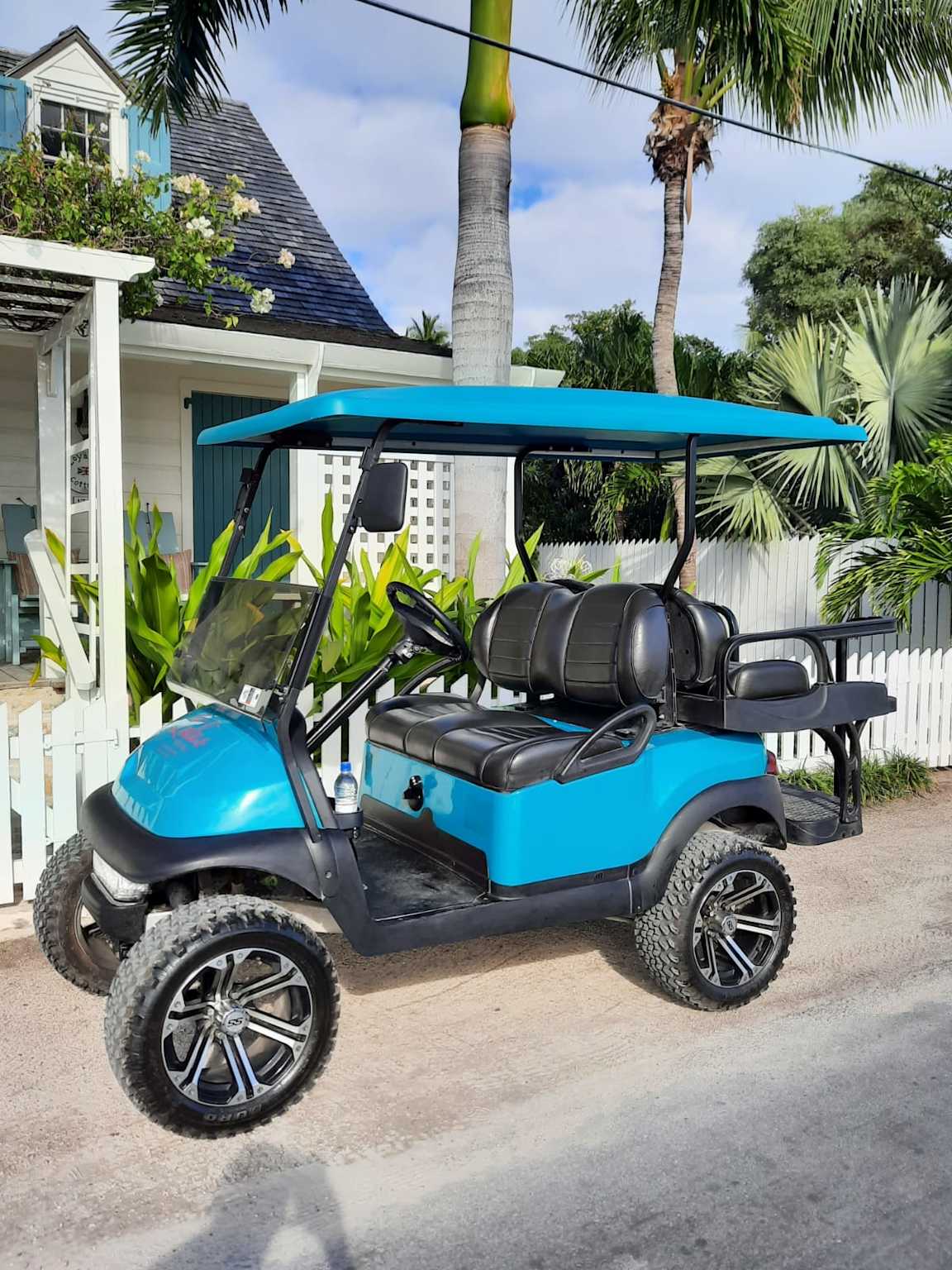 Luxury 4-seater cart in a coastal neighborhood